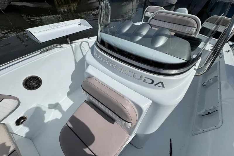 Slide: The Image of 2022 Barracuda 188 CCR boat interior with seating and console details. - 12