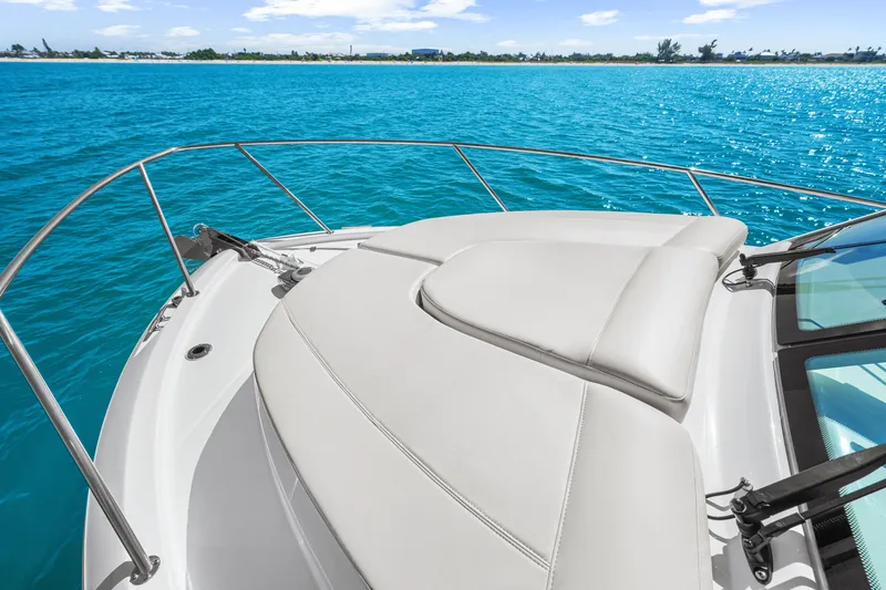 Slide: The Image of The 2027 Boston Whaler 285 Conquest features a sleek deck design with comfortable cushions. - 38