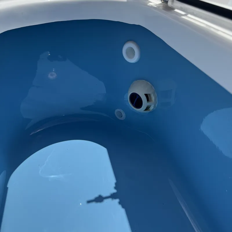 Slide: The Image of Interior view of 2026 Tidewater 2110 Bay Max boat. - 23