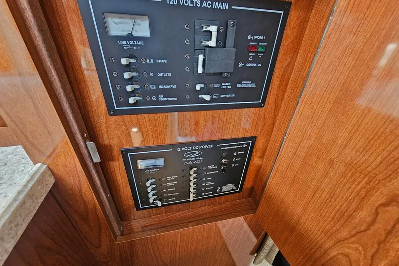 Slide: The Image of Electrical control panel on a 2009 Regal 2860 Window Express boat. - 30