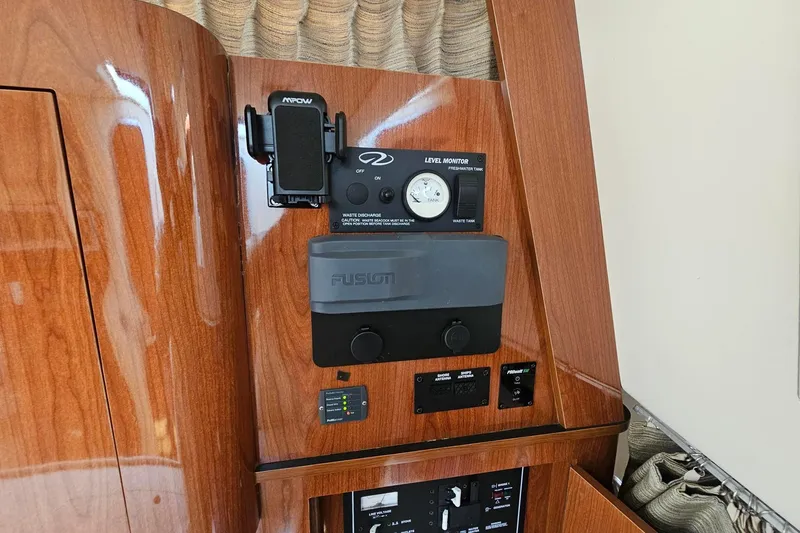 Slide: The Image of Control panel of a 2009 Regal 2860 Window Express boat interior. - 31