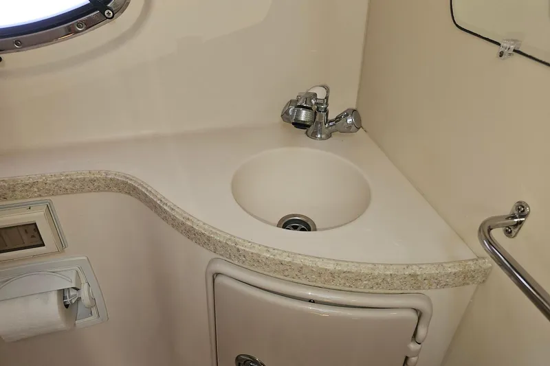 Slide: The Image of 2009 Regal 2860 Window Express bathroom sink with faucet and countertop. - 34