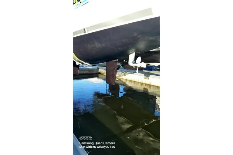 Slide: The Image of Underwater view of Lagoon 450 F catamaran's propeller and rudder, 2016 model. - 13