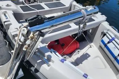 Slide: The Image of 2016 Lagoon 450 F yacht deck with stainless steel fittings and red equipment. - 5