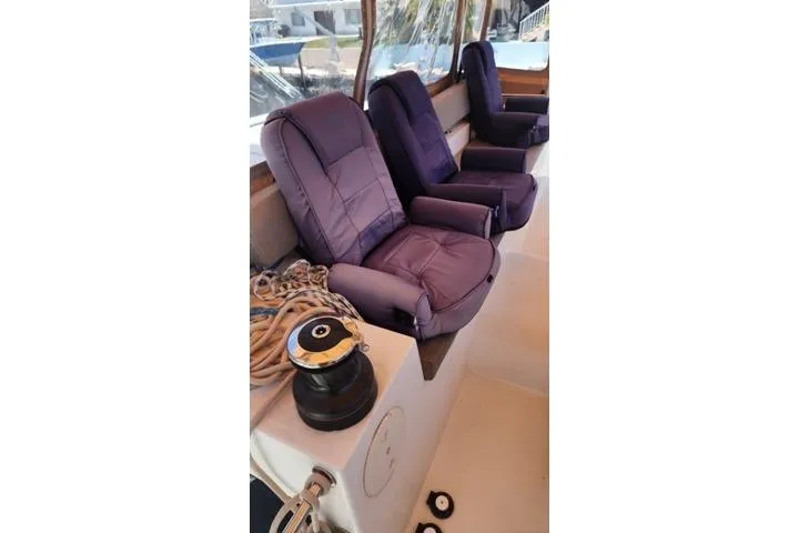 Slide: The Image of Luxurious seating on 2016 Lagoon 450 F yacht deck with winch and ropes. - 9