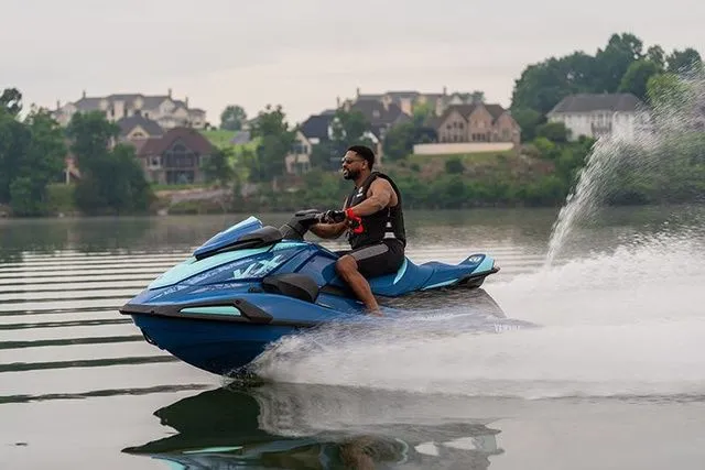 Slide: The Image of Man riding 2026 Yamaha WaveRunner VX Cruiser on a calm lake. - 4