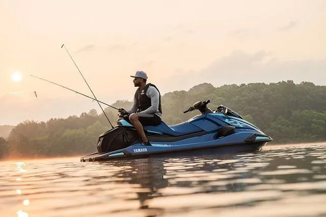 Slide: The Image of Man fishing on a 2026 Yamaha WaveRunner VX Cruiser at sunset. - 6