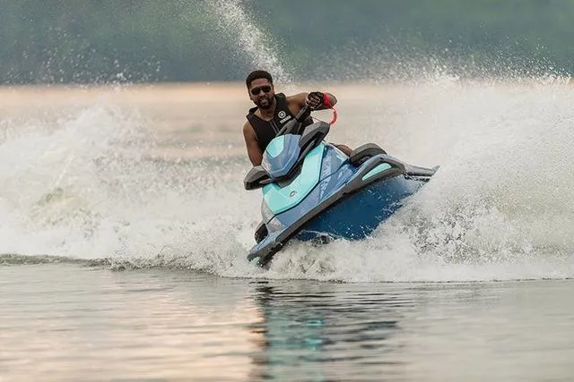 Slide: The Image of Man riding 2026 Yamaha WaveRunner VX Cruiser on water. - 7