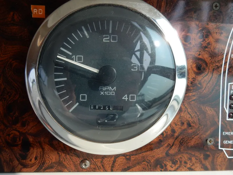 Slide: The Image of Tachometer of a 1997 Sea Ray 450 Sundancer boat. - 26