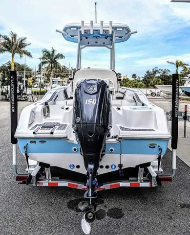 Slide: The Image of 2024 Tidewater 210 CC Adventure boat with outboard motor. - 4