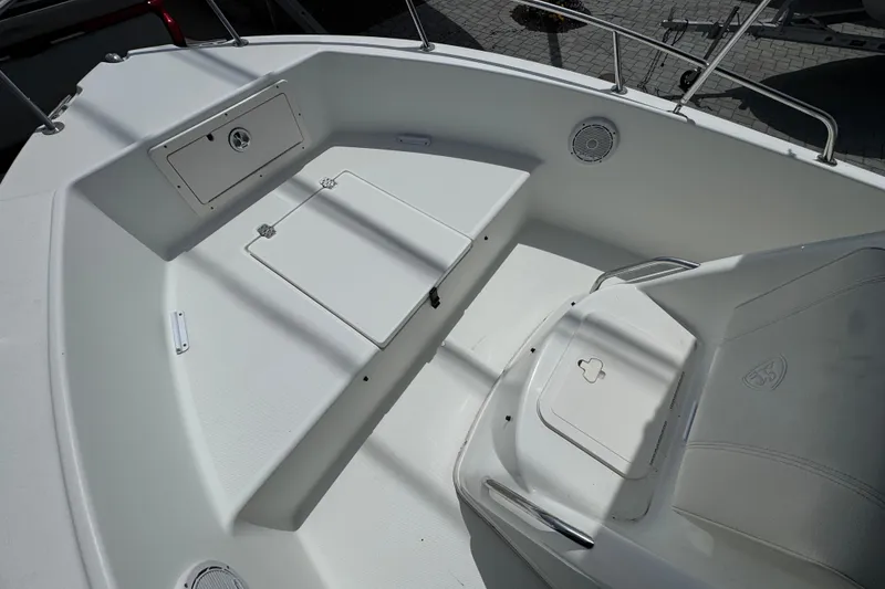 Slide: The Image of 2010 Century 1801 Center Console boat interior with seating and storage compartments. - 10