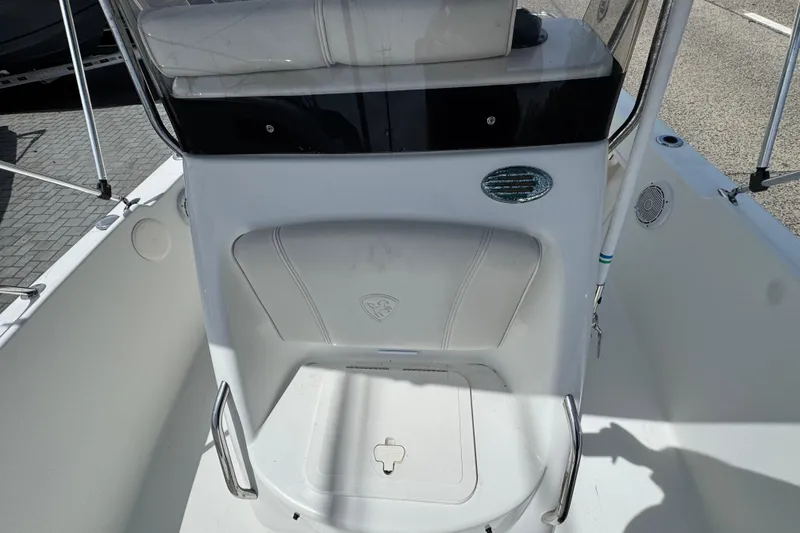Slide: The Image of 2010 Century 1801 Center Console boat interior with seating and storage. - 12