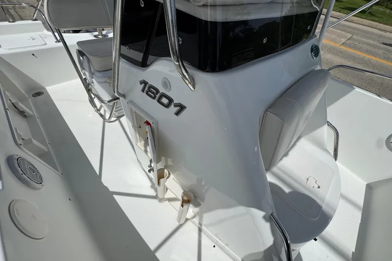 Slide: The Image of 2010 Century 1801 Center Console boat interior with seating and console details. - 14