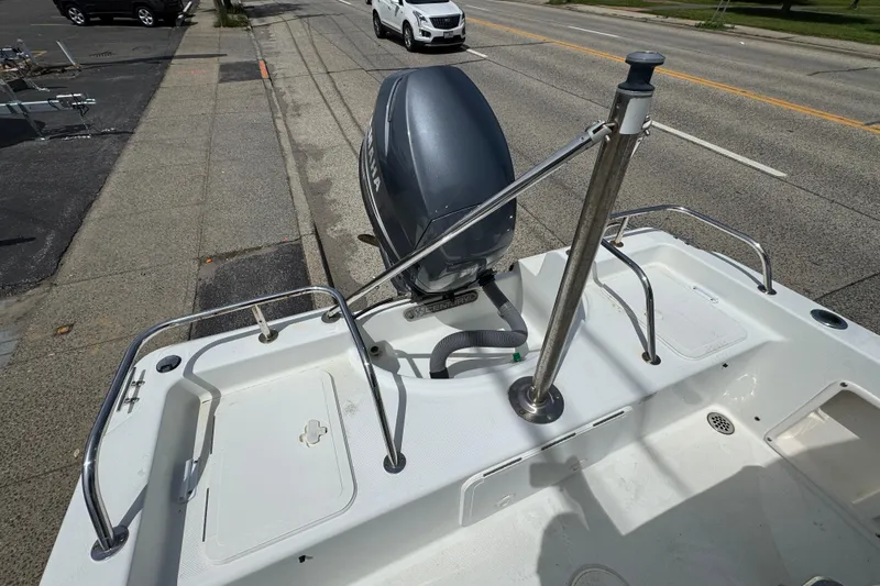 Slide: The Image of 2010 Century 1801 Center Console boat with Yamaha outboard motor on a street. - 17