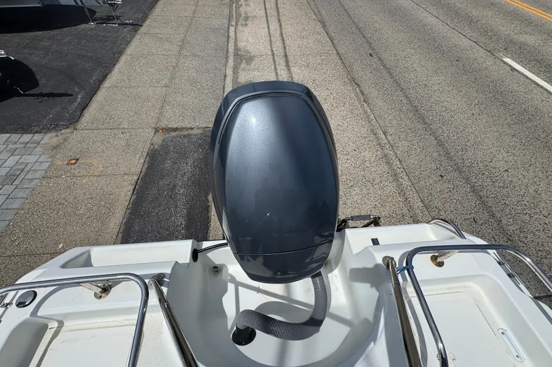 Slide: The Image of 2010 Century 1801 Center Console boat engine on a trailer, viewed from above. - 18
