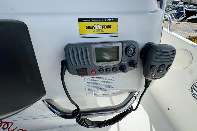 Slide: The Image of Century 1801 Center Console 2010 with Raymarine VHF radio and Sea Tow sticker. - 7