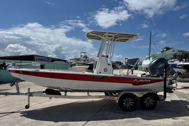 The Image of Cobia 305 Center Console 2026 on trailer outdoors. - 1