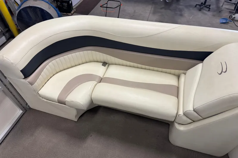 Slide: The Image of 2008 Bennington 2075GSi boat seating, featuring cream and beige upholstery with elegant design. - 6