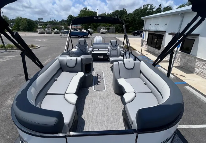 Slide: The Image of Luxurious 2025 Tahoe LTZ VRB 23T DX pontoon boat with gray seating. - 10