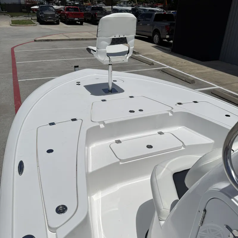Slide: The Image of 2026 Tidewater 2110 Bay Max boat with seating and storage. - 11