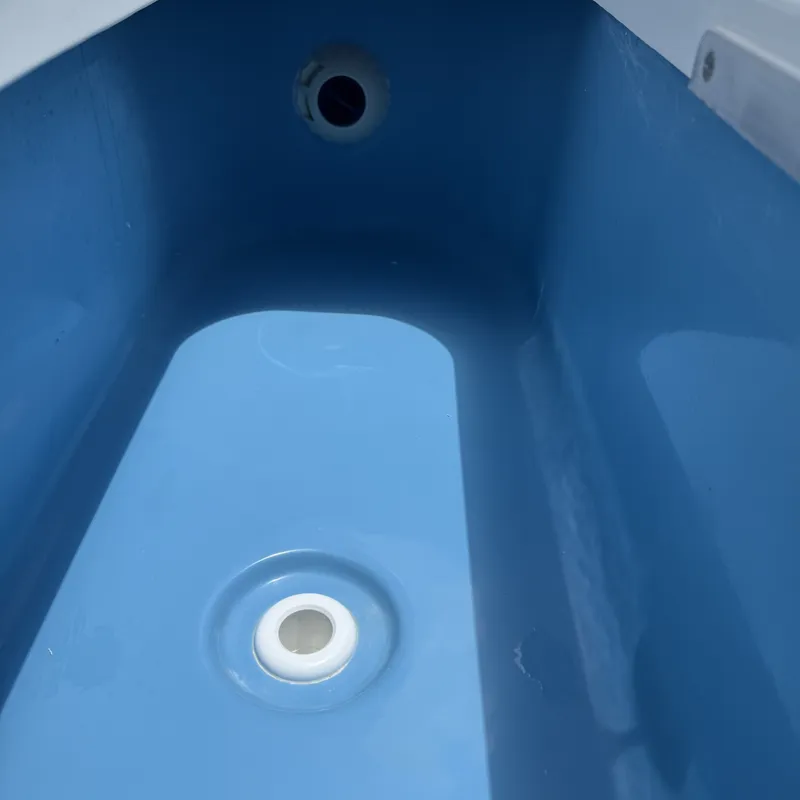 Slide: The Image of Interior view of 2026 Tidewater 2110 Bay Max boat. - 14