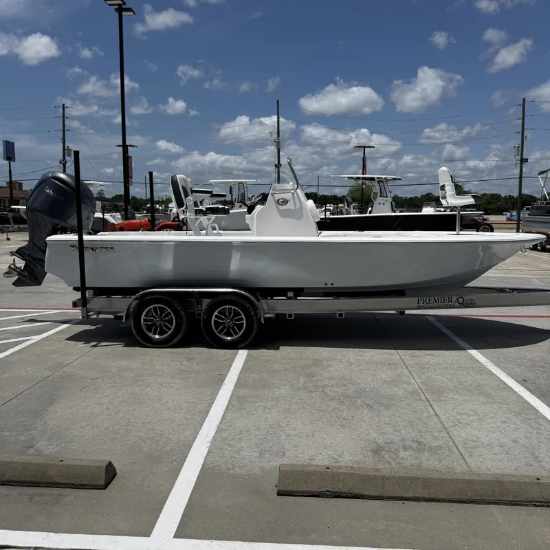 Slide: The Image of 2026 Tidewater 2110 Bay Max boat on trailer outdoors. - 6