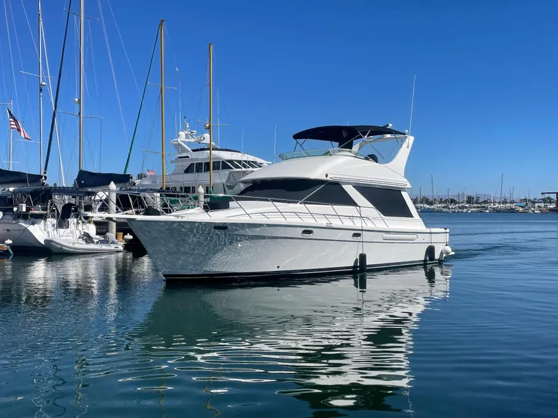 The Image of 1996 Bayliner 3988 Command Bridge Motoryacht in harbor. - 0