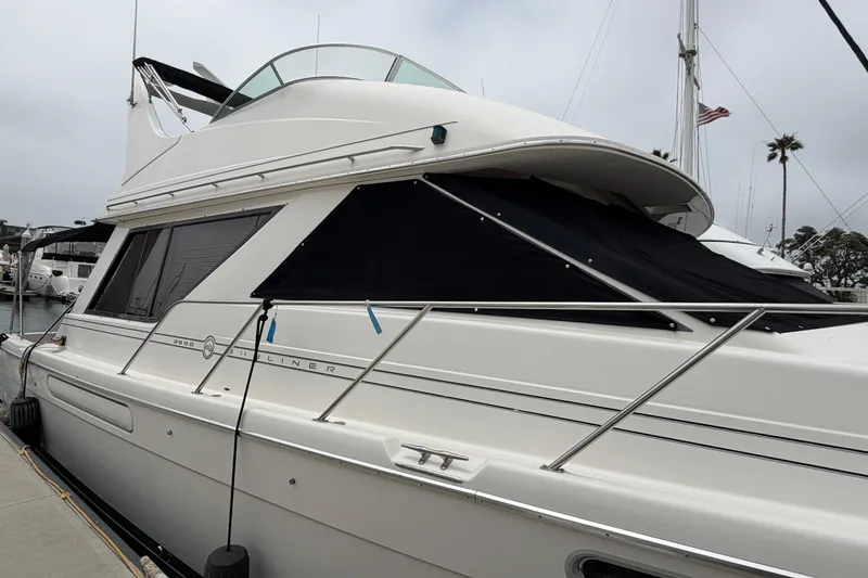 Slide: The Image of 1996 Bayliner 3988 Command Bridge Motoryacht docked at marina. - 5