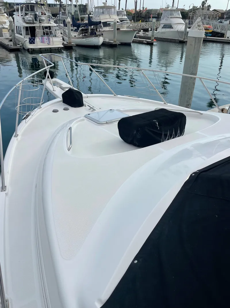 Slide: The Image of 1996 Bayliner 3988 Command Bridge Motoryacht docked in marina. - 8