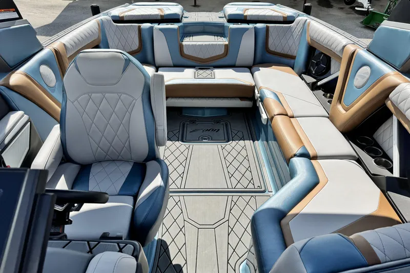 Slide: The Image of 2021 Tigé 23ZX boat interior with luxurious seating and modern design. - 11