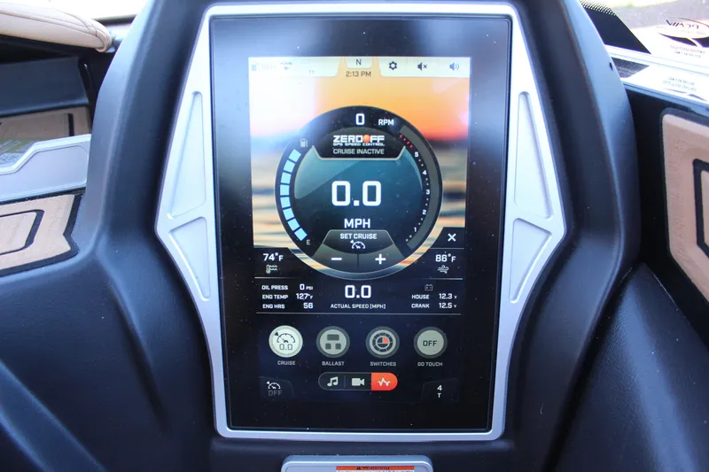 Slide: The Image of Touchscreen display of a 2022 Tigé 22RZX boat showing speed and control settings. - 18