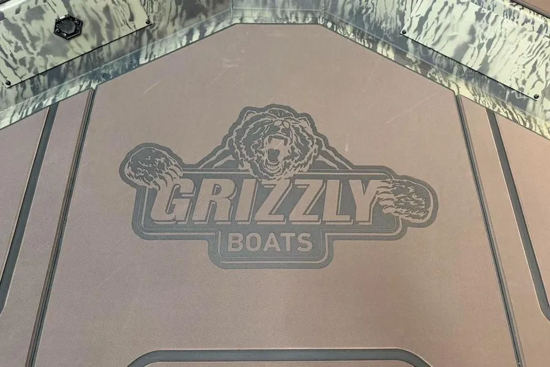 Slide: The Image of 2017 Tracker Pro Team 175 TXW boat deck with Grizzly Boats logo. - 4