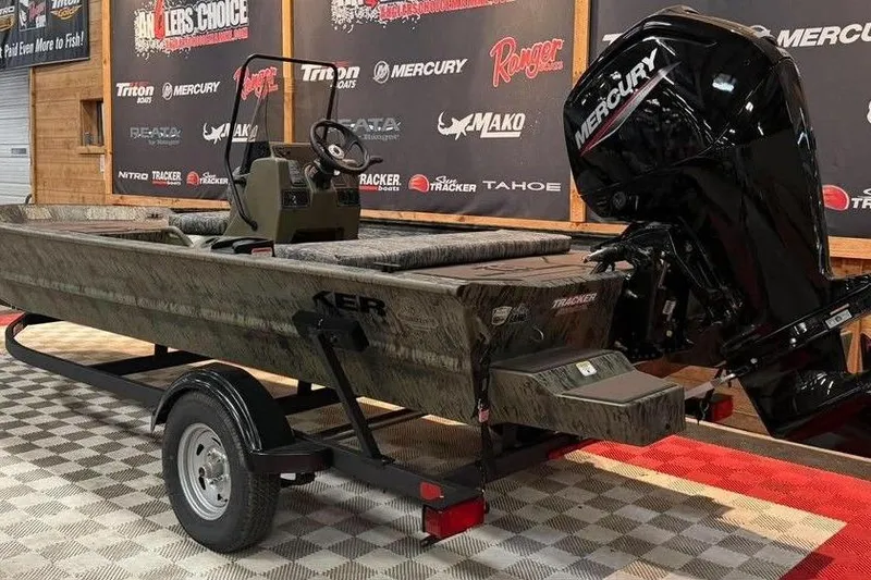 Slide: The Image of 2017 Tracker Pro Team 175 TXW boat with Mercury engine on display. - 6