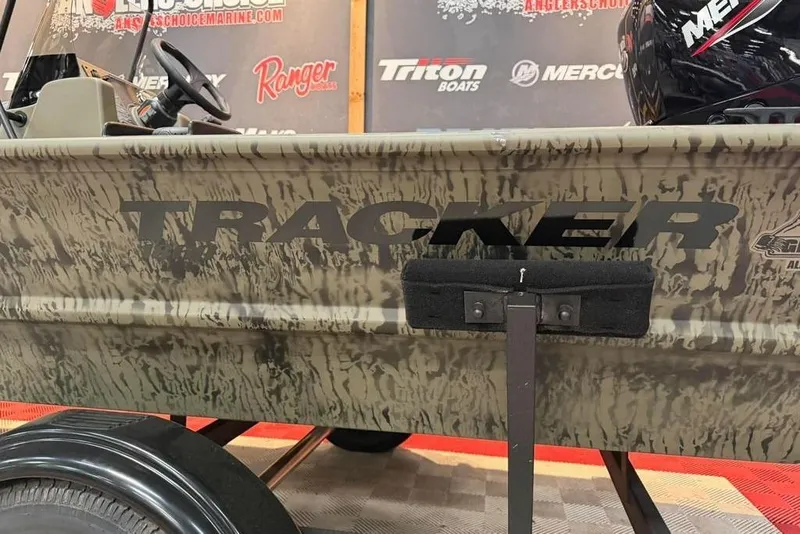 Slide: The Image of 2017 Tracker Pro Team 175 TXW boat with camouflage design and branding. - 7