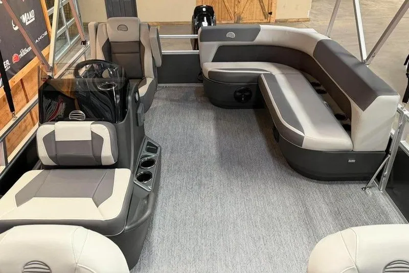 Slide: The Image of 2026 Sun Tracker Bass Buggy 16 XL Select interior with gray seating and modern design. - 10