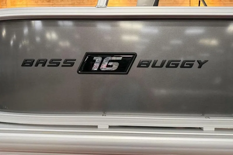 Slide: The Image of 2026 Sun Tracker Bass Buggy 16 XL Select logo on metallic surface. - 7