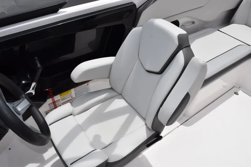 Slide: The Image of 2023 Yamaha Boats AR250 captain's chair with sleek, modern design and comfortable seating. - 11