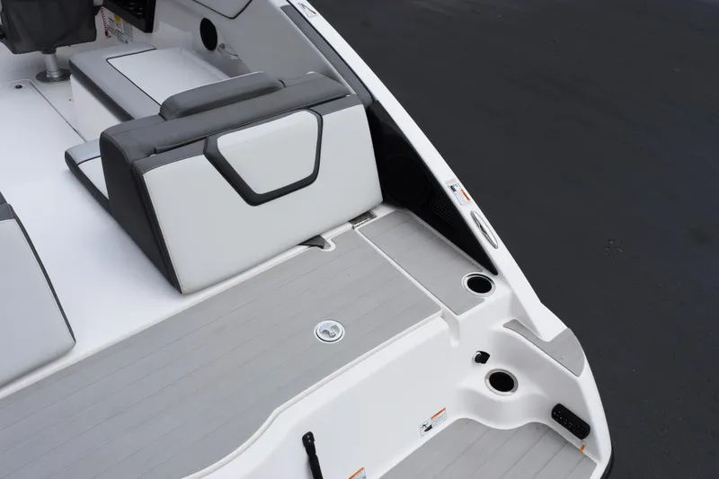 Slide: The Image of 2023 Yamaha Boats AR250 interior, featuring sleek seating and modern design elements. - 7