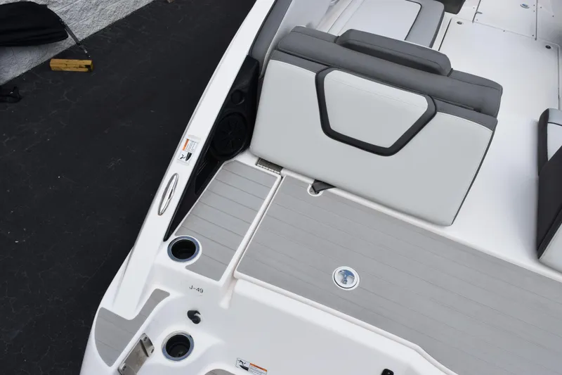Slide: The Image of 2023 Yamaha Boats AR250 interior with sleek seating and modern design elements. - 8