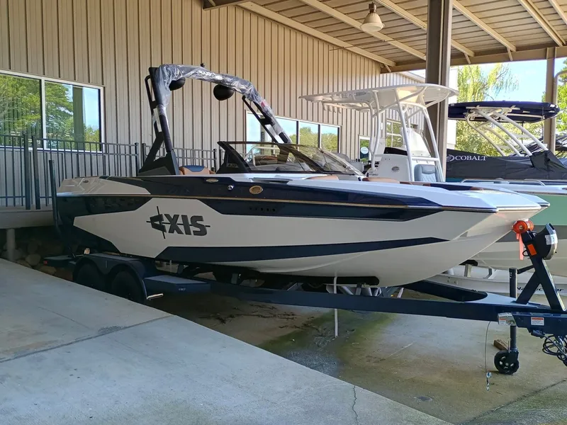 The Image of 2025 Axis A20 boat in a covered storage area. - 1