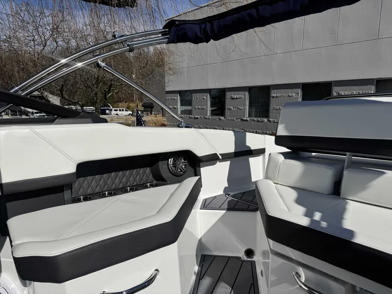 Slide: The Image of Interior of 2026 Cobalt R4 boat with luxurious white seating. - 13