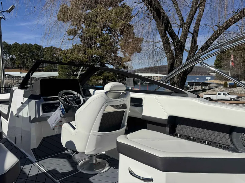 Slide: The Image of Interior of 2026 Cobalt R4 boat with luxurious seating and dashboard. - 16