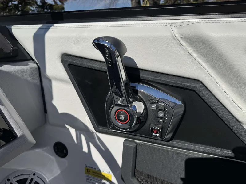 Slide: The Image of Cobalt R4 2026 boat control with start-stop button. - 23