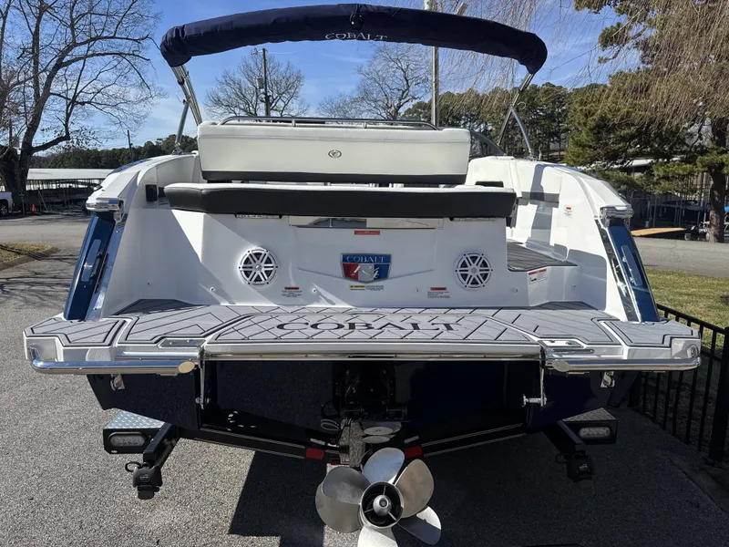 Slide: The Image of Rear view of a 2026 Cobalt R4 boat with swim platform. - 25
