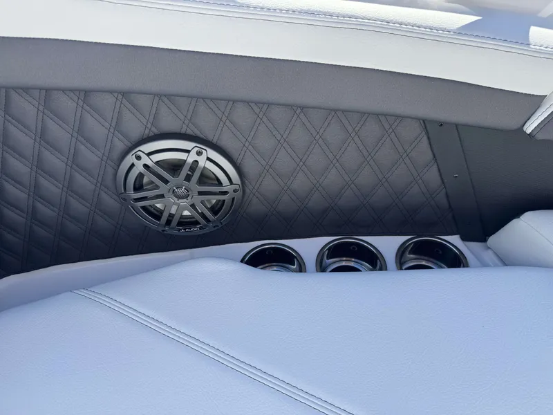 Slide: The Image of Speaker and cup holders in Cobalt R4 2026 boat. - 3