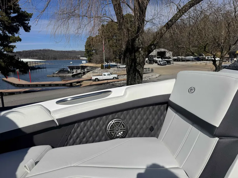 Slide: The Image of Cobalt R4 2026 boat with luxurious interior by the lakeside. - 5