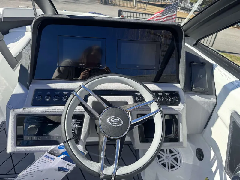 Slide: The Image of Interior view of Cobalt R4 2026 boat cockpit with modern controls. - 8