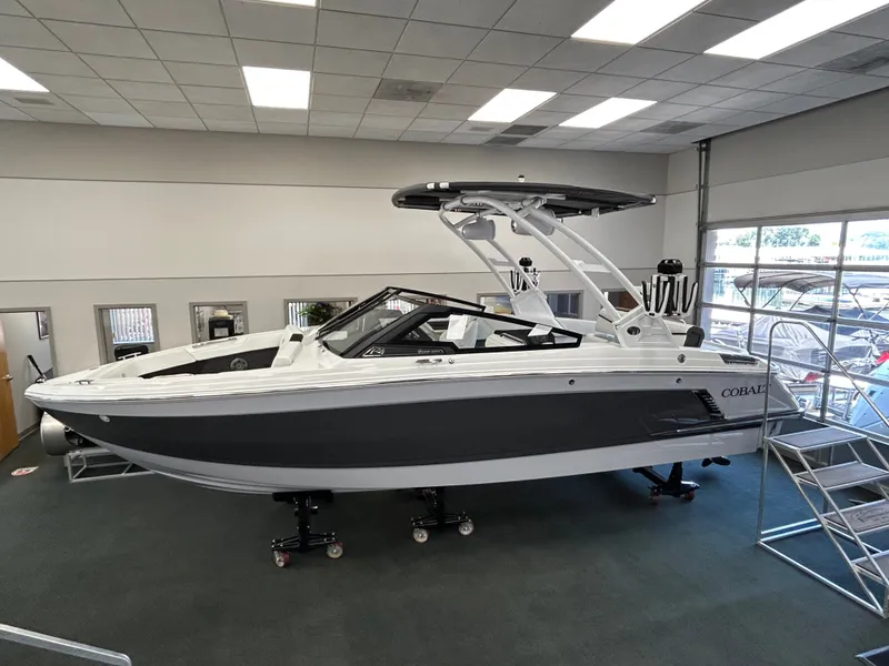 The Image of 2025 Cobalt R4 Surf boat in showroom. - 1
