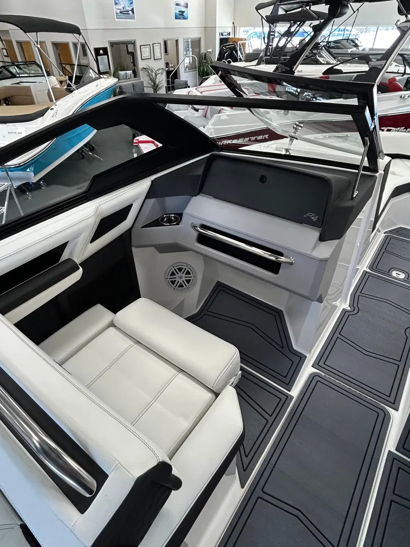 Slide: The Image of Interior of 2025 Cobalt R4 Surf with modern seating and dashboard. - 10