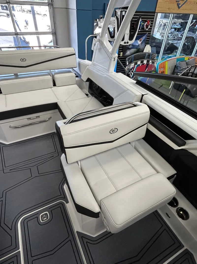Slide: The Image of Interior of 2025 Cobalt R4 Surf featuring luxurious white seating. - 11
